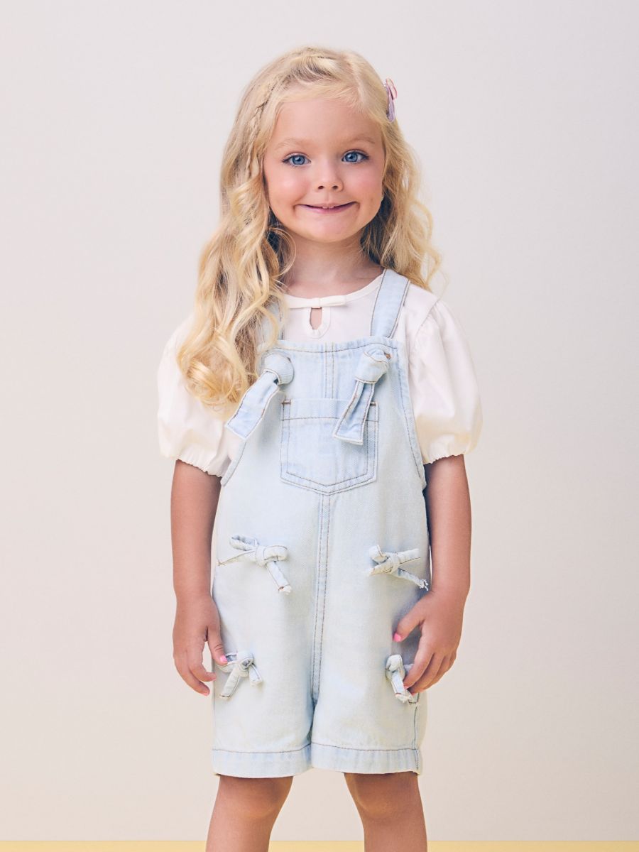 Jeans dungarees with bows